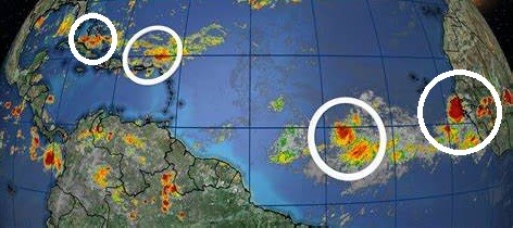 Cuatro Ondas Tropicales con diferente grado de desarrollo